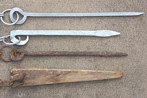 Different types of stakes for use with steel gin traps