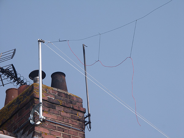 Showing the linear loading and pulley mount of my 80m antenna