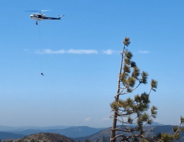 Helicopter with Fire Suppressent Container