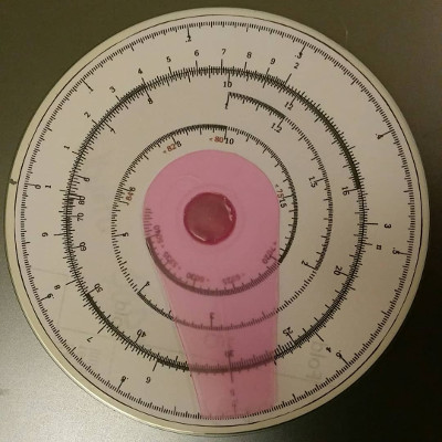 back side of slide-rule/slide-round