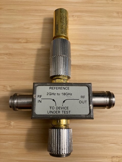 Wiltron 58A50 Autotester (VSWR Bridge) + 28A50-1 50 Ohm APC-7 Termination. Autotester has APC-7 test port with N-Female RF In and RF Out ports.
