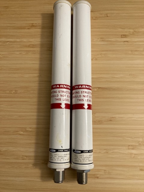 Photo of two TECOM 505036D 2.4 to 2.485 GHz WiFi Antennas, Vertical. Standard N-Female connector.