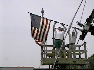 KD4AFL and WA4MOK mounting US Flag.