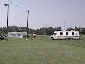 Field Day sign and Sheriff's emergency communications van