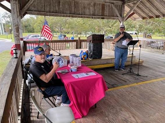 A group of men sitting at a table

AI-generated content may be incorrect.