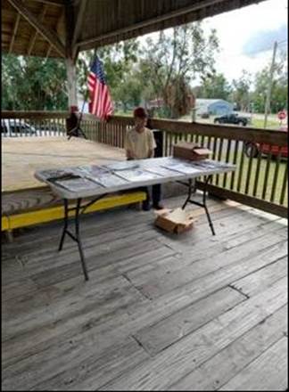 A person sitting at a table

AI-generated content may be incorrect.