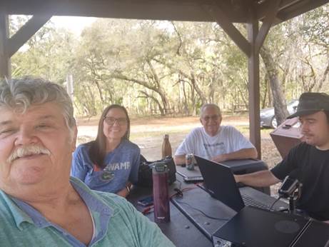 A couple of men sitting at a table

AI-generated content may be incorrect.