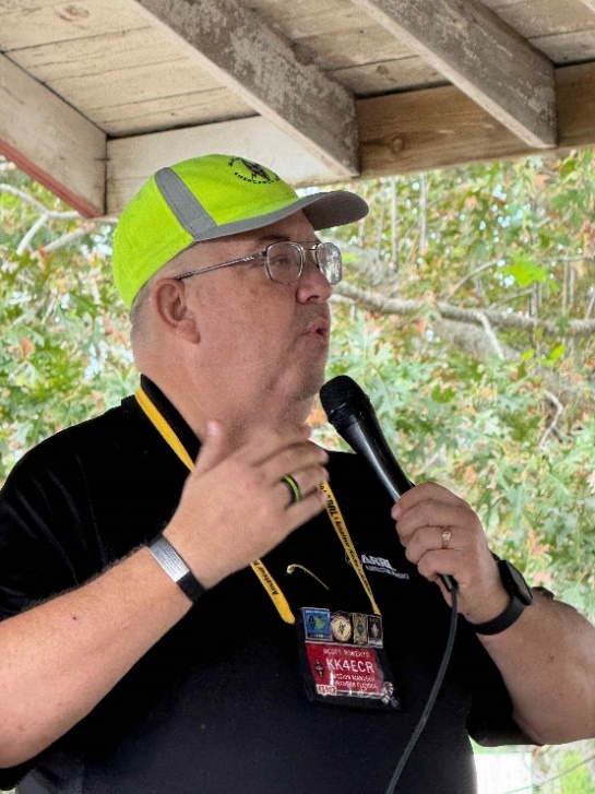 A group of people standing in a room

AI-generated content may be incorrect.