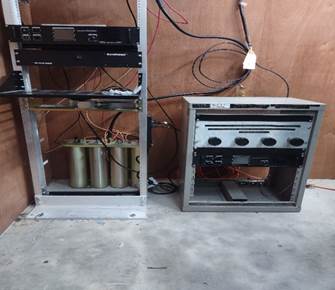 A two metal boxes with wires and wires

Description automatically generated with medium confidence
