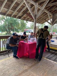 A person sitting on a porch

Description automatically generated