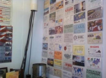 Picture of more qsl cards and coax in the man cave.